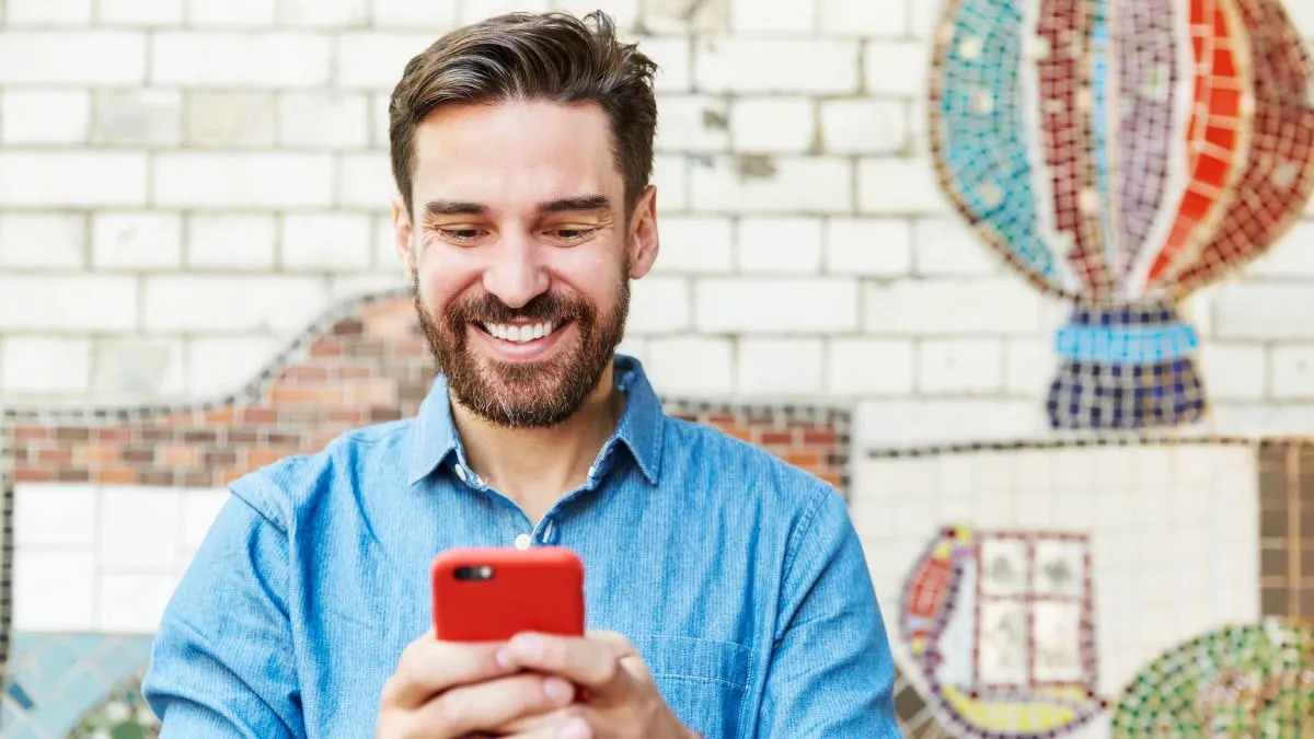 man looking at phone 