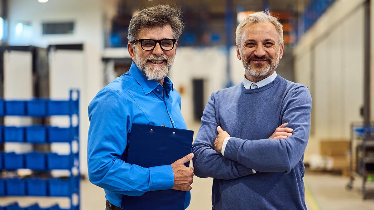 Two Colleagues At The Factory